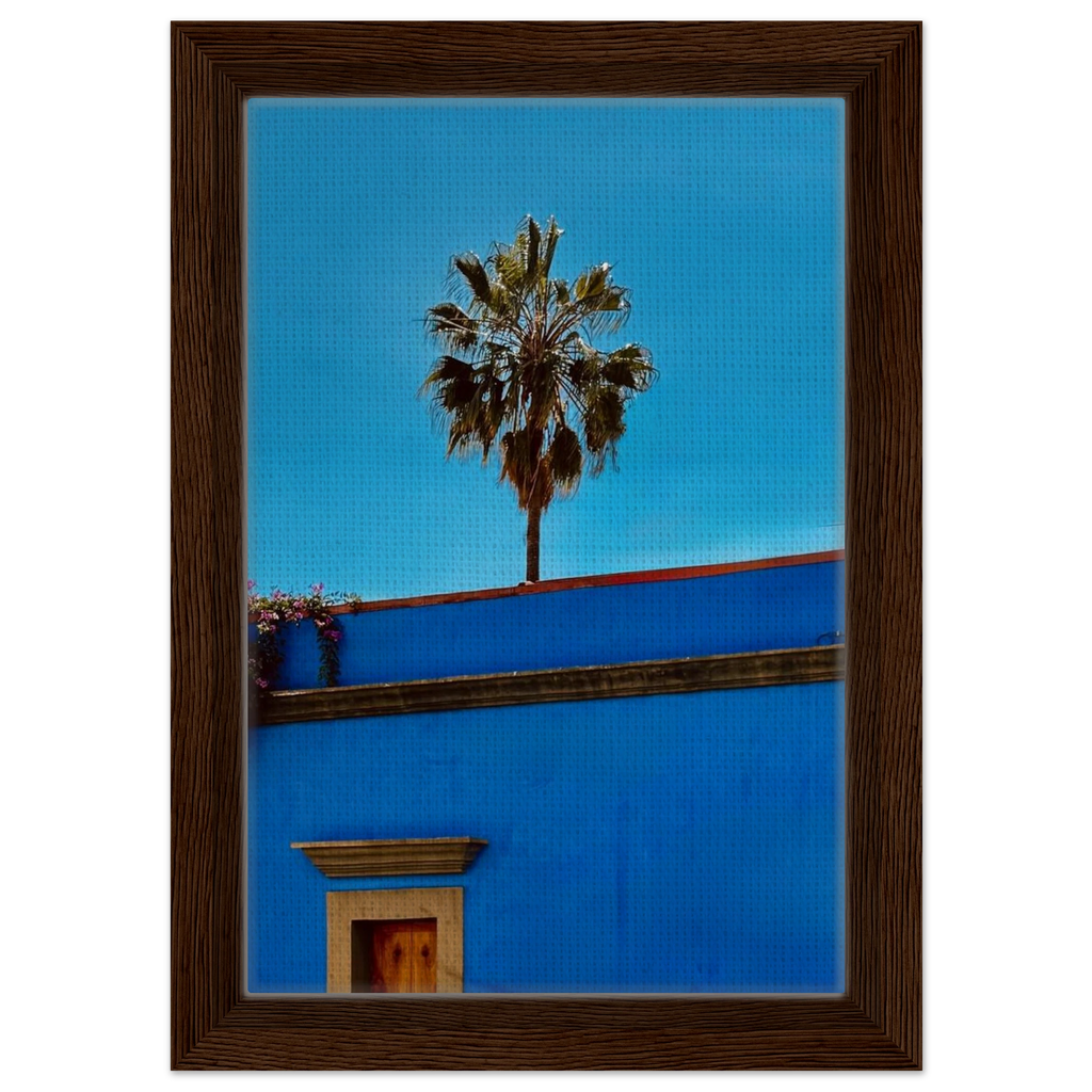 Oaxaca palm tree wall art print by CaliCuration featuring a blue-framed canvas showcasing a Mexican landscape scene