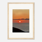 Vibrant Mediterranean Sunset framed poster print from My Store's travel collection, showcasing warm sunset colors and scenic coastal views.
