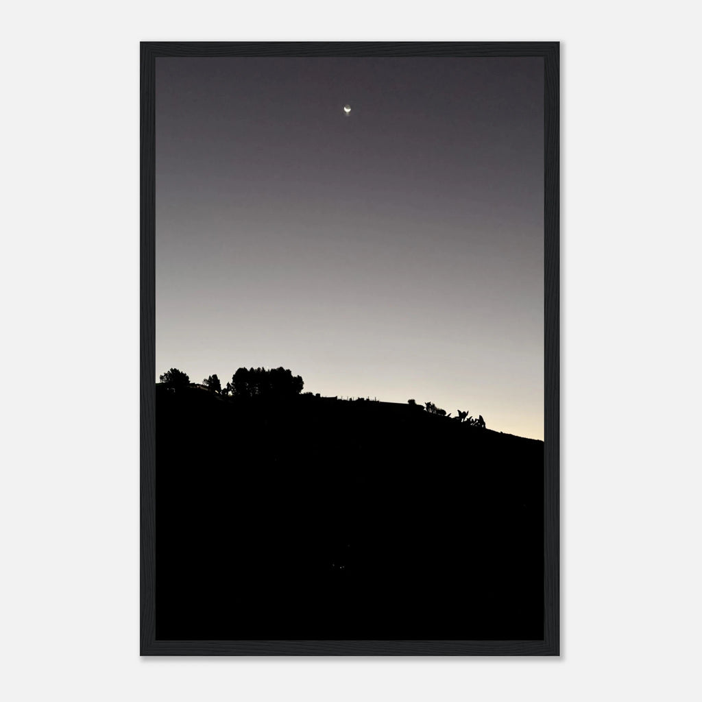 Black and white Hollywood Hills fall moon poster print with wooden frame, part of the California Studio Edition art collection.
