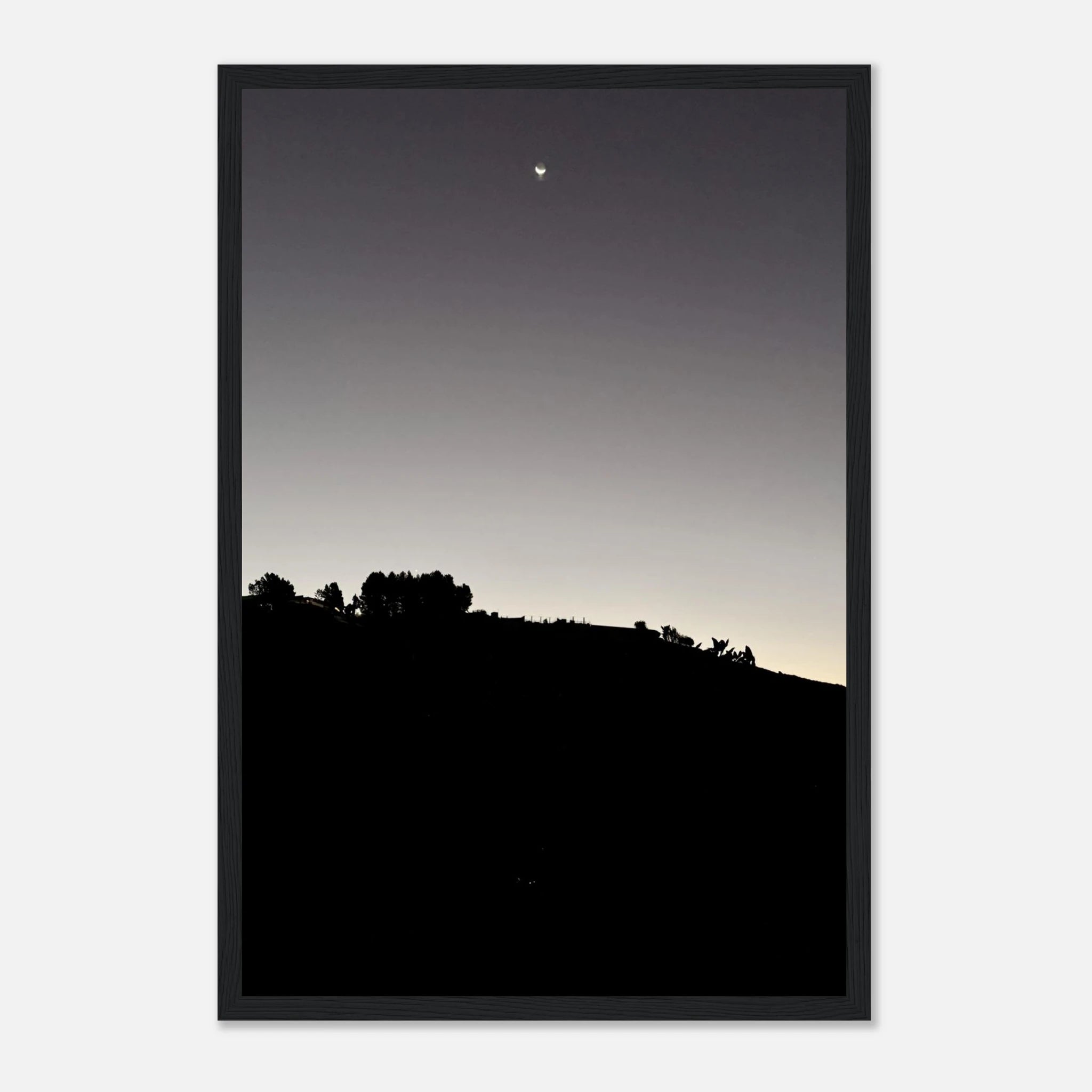 Black and white Hollywood Hills fall moon poster print with wooden frame, part of the California Studio Edition art collection.
