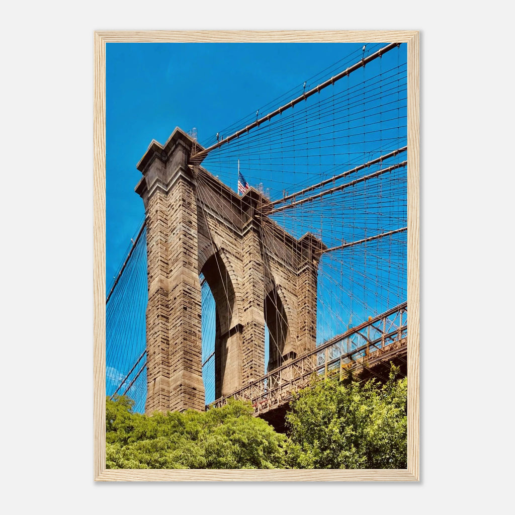 Framed NYC Brooklyn Bridge poster featuring a Dumbo view, showcasing New York City skyline in a stylish Studio Edition print.