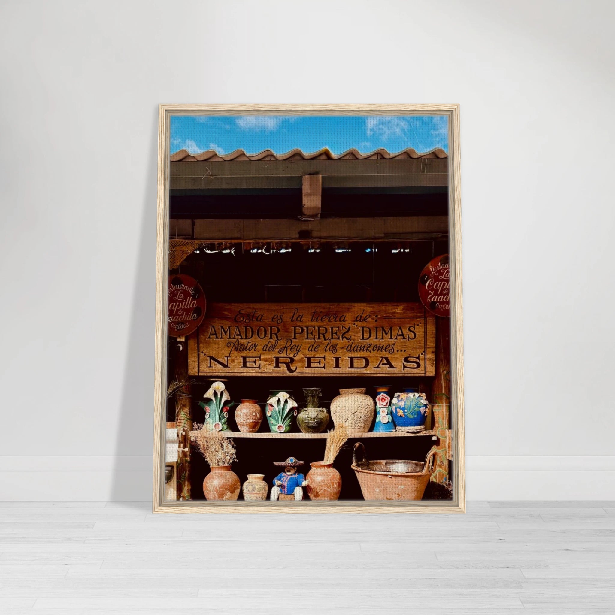 Framed canvas print of Oaxaca street fair scene from CaliCuration's Mexico travel collection, showcasing vibrant local festivities.