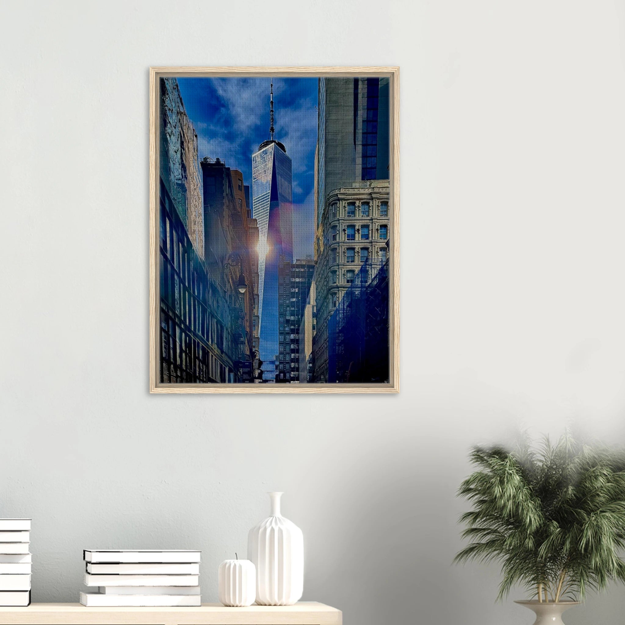 Framed canvas print of sunlight reflecting on One World Trade Center in NYC from the Travel Collection, studio edition.