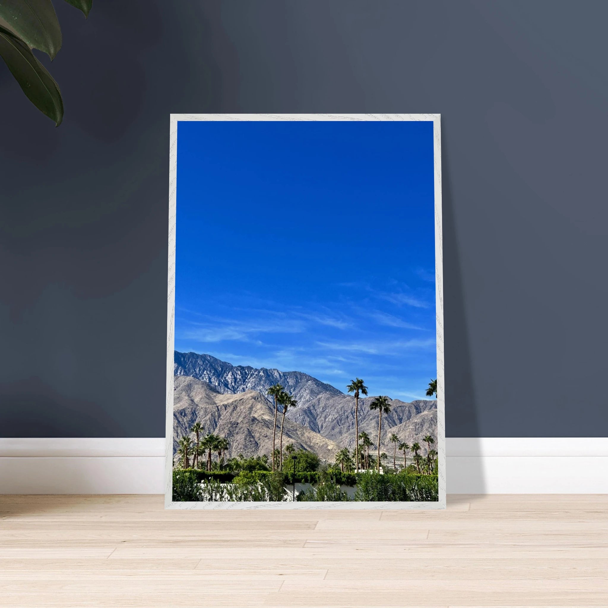 Wooden framed poster of a sunny fall day in Palm Springs, California, featuring vibrant autumn scenery and colorful foliage.