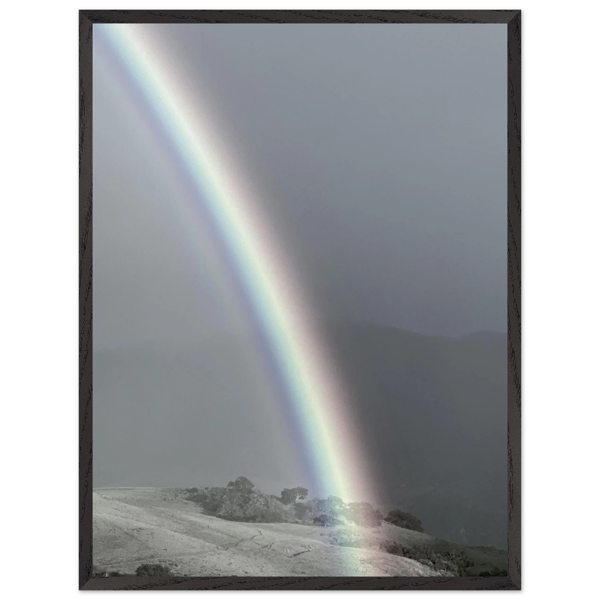 Black and white mounted framed poster of a post-summer storm rainbow from the California Central Coast travel collection, studio edition.