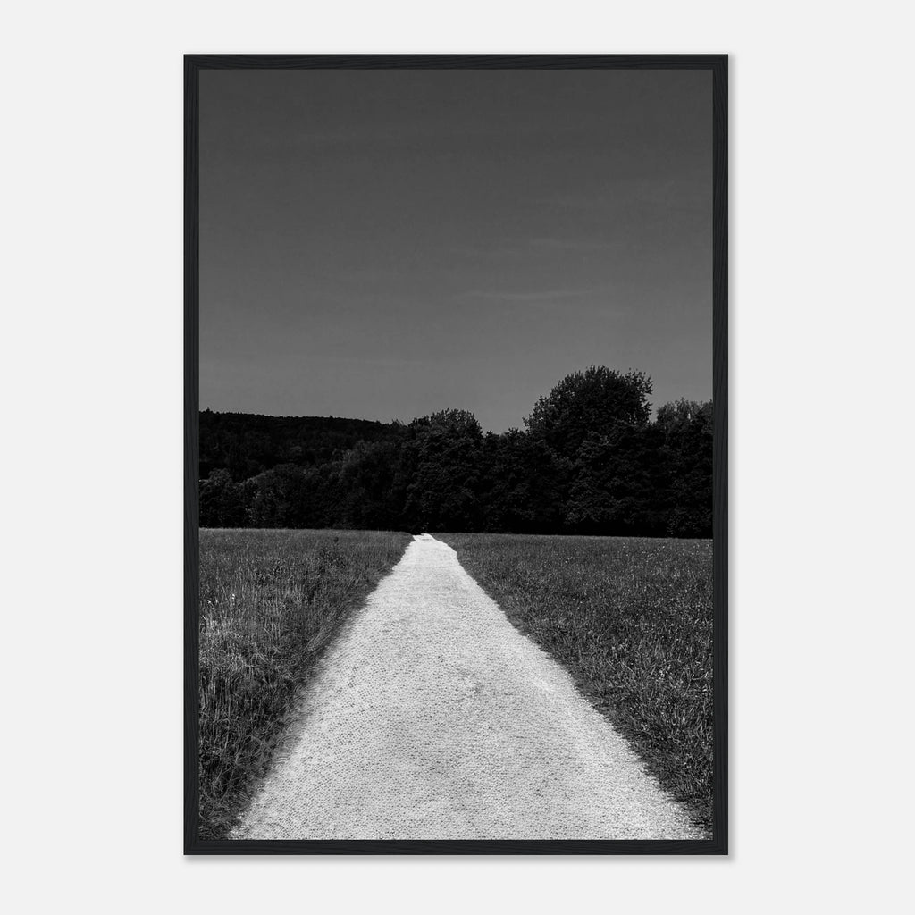 Black and white framed poster print of a summer road scene from the Travel Collection, featuring a wooden frame and semi-glossy paper finish.