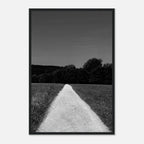 Black and white framed poster print of a summer road scene from the Travel Collection, featuring a wooden frame and semi-glossy paper finish.