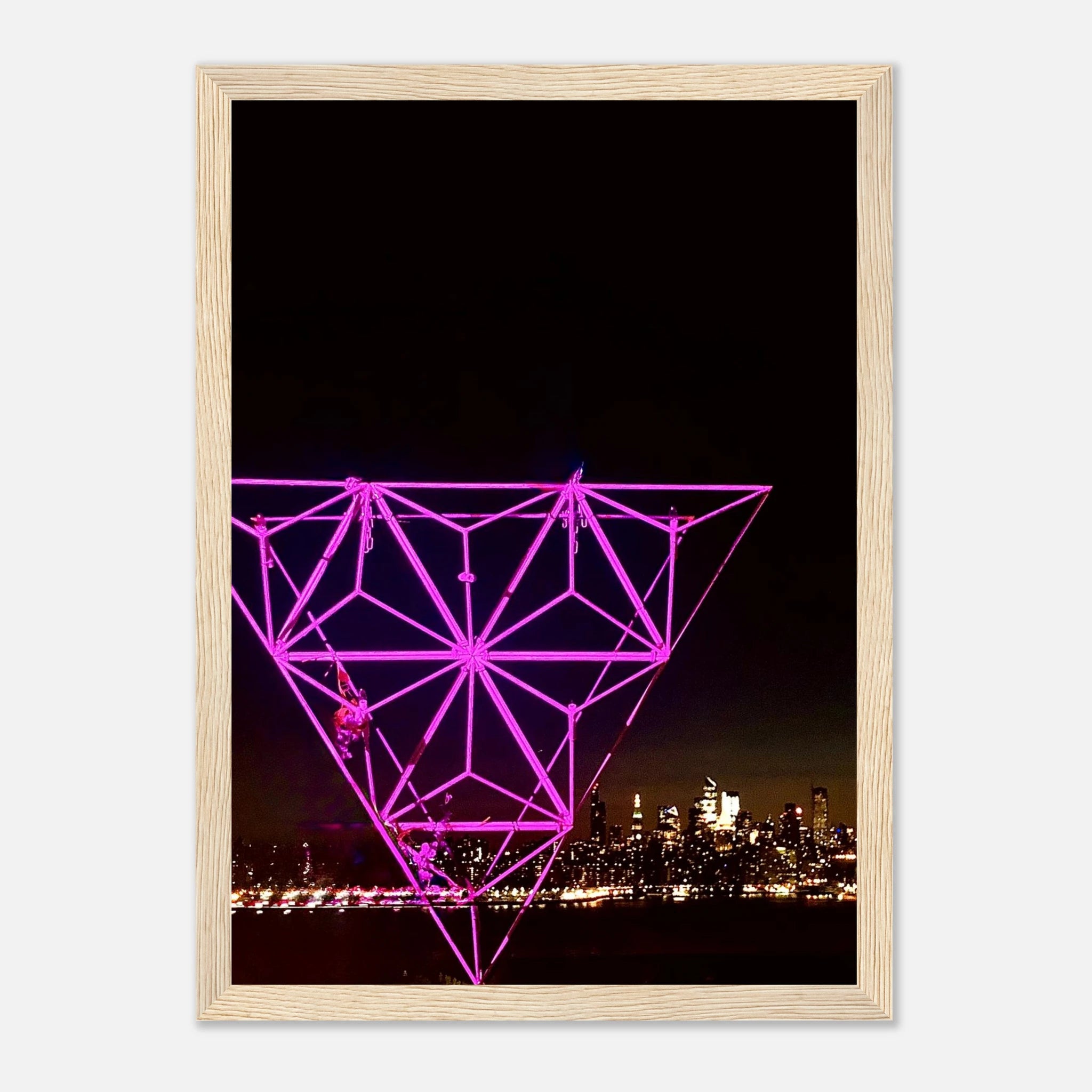 Framed print of New York City holiday art showing a vibrant Manhattan night view with Empire State Building in purple hues.