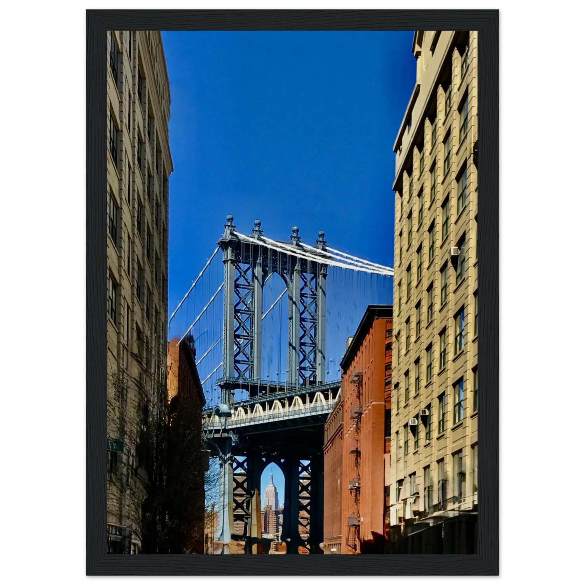 Wooden framed print of NYC Dumbo skyline featuring spring day scene, wall art from CaliCuration's travel collection.