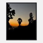 Framed Hollywood Hills poster featuring a winter sunset in Laurel Canyon, California, with vibrant colors and scenic mountain views.