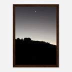 Wooden framed semi-glossy black and white poster of Hollywood Hills with a new moon, part of California poster art series.