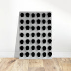 Black and white monochrome skull grid canvas wall art, minimalist statement photography print from the Travel Collection Studio Edition.