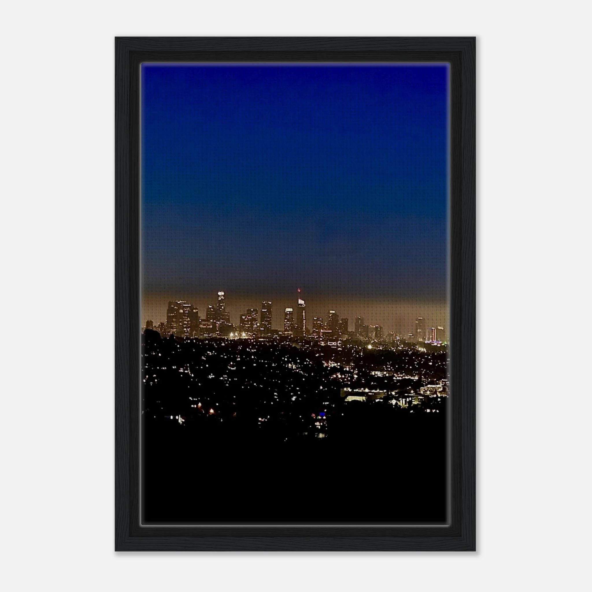 Premium wooden framed canvas print of Los Angeles Downtown Nightglow, elegant home wall art featuring vibrant cityscape at night.