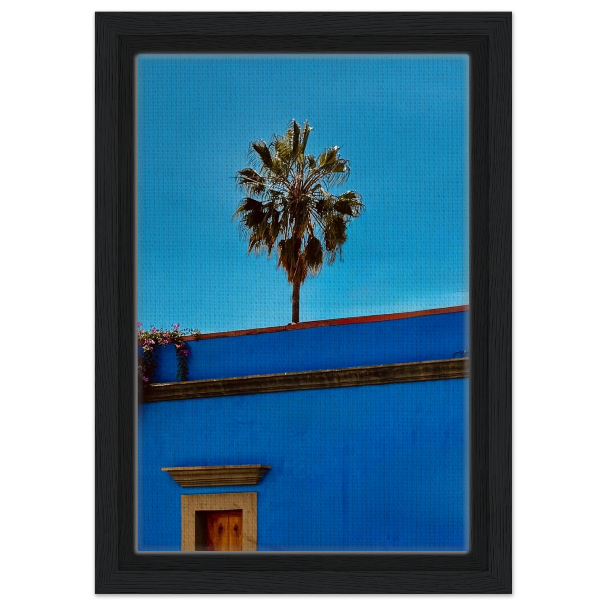 Oaxaca streets with palm trees in blue framed canvas artwork by CaliCuration, featuring vibrant travel-inspired print artwork.