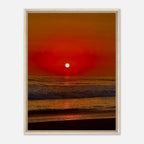 Framed canvas print of California Red Sunset Series 2/3 by CaliCuration featuring vibrant red sunset hues and artistic landscape imagery.