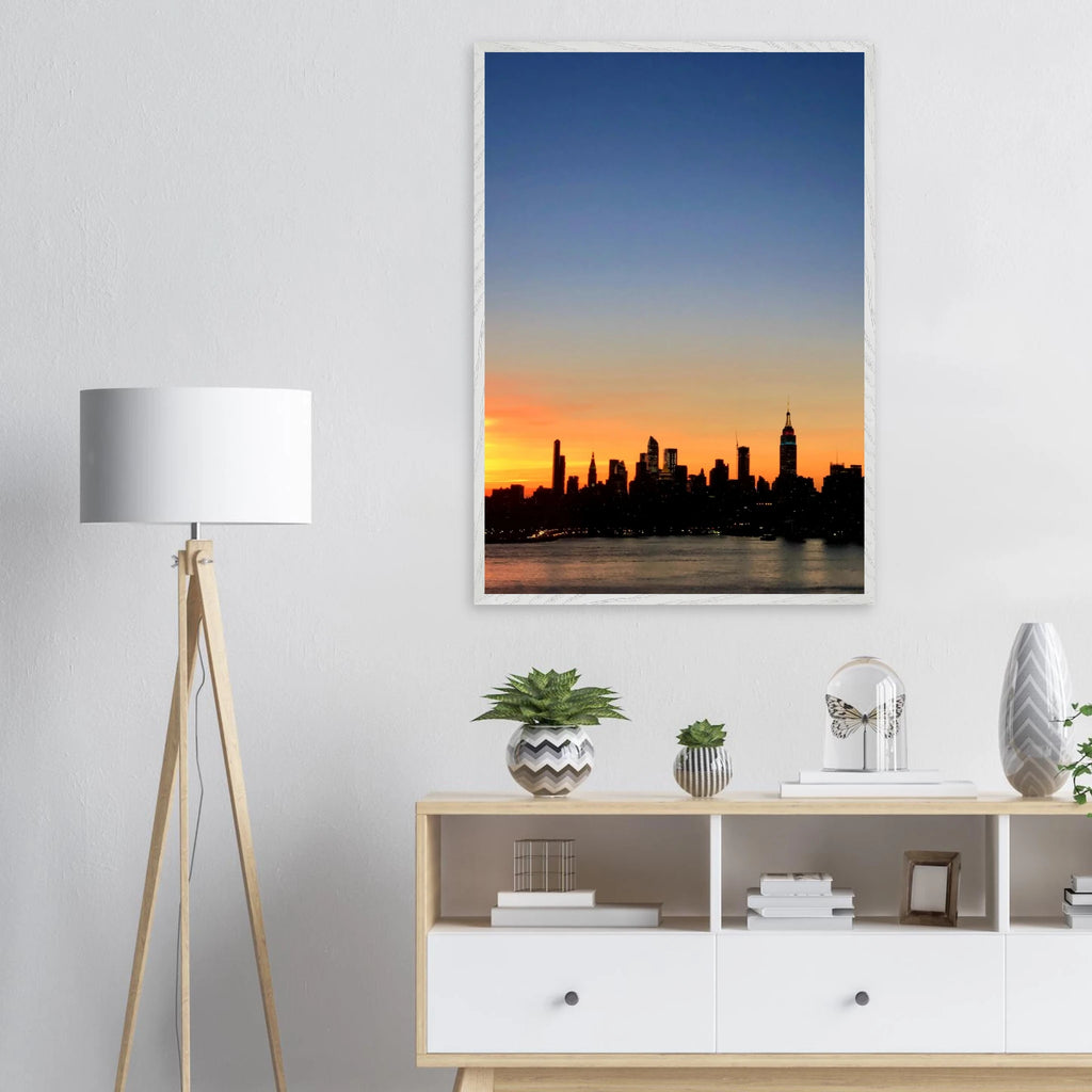 Wooden framed Manhattan skyline sunset poster featuring vibrant cityscape wall art from the Travel Collection.