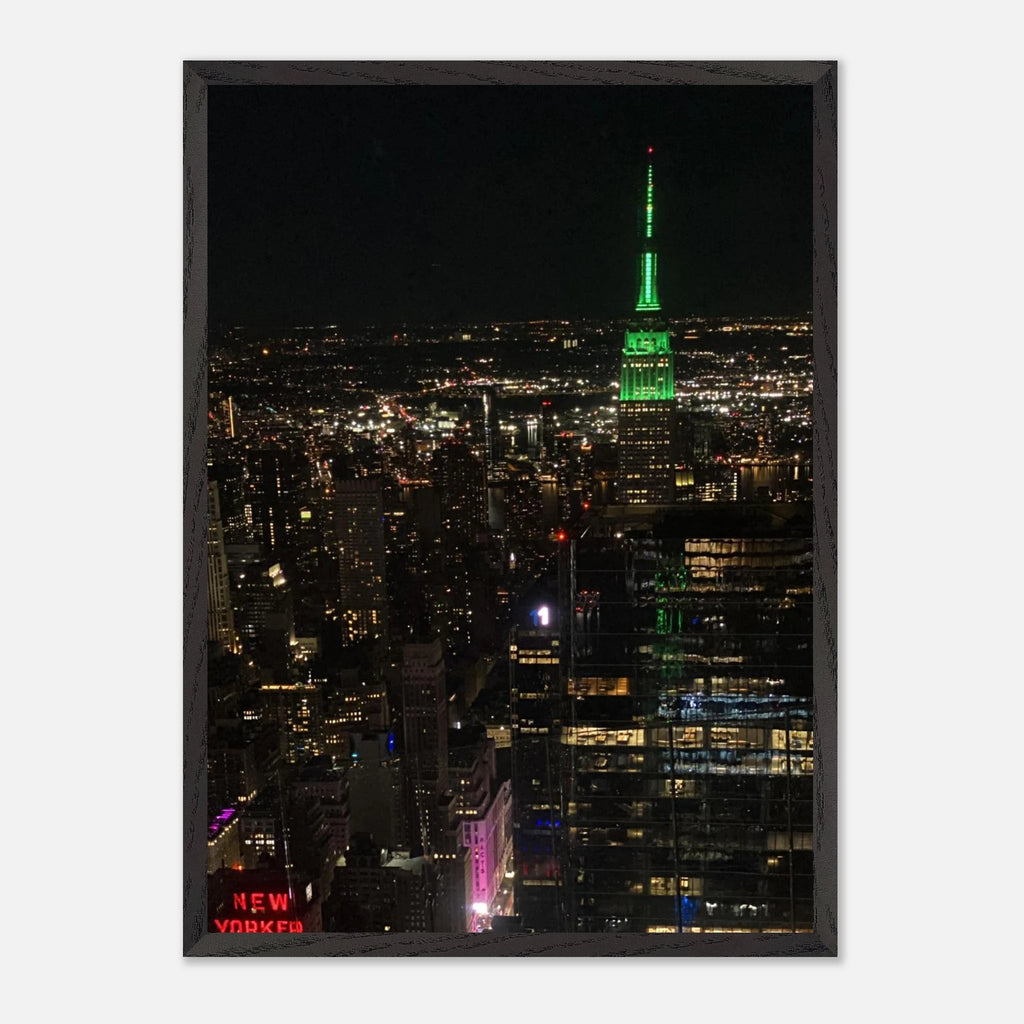 Premium wood-mounted framed poster of NYC Downtown night view featuring the Empire State Building, from the Studio Edition Travel Collection.