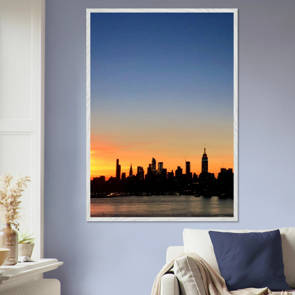 Manhattan Skyline Sunset framed poster featuring NYC wall art, showcasing vibrant sunset colors and cityscape details.