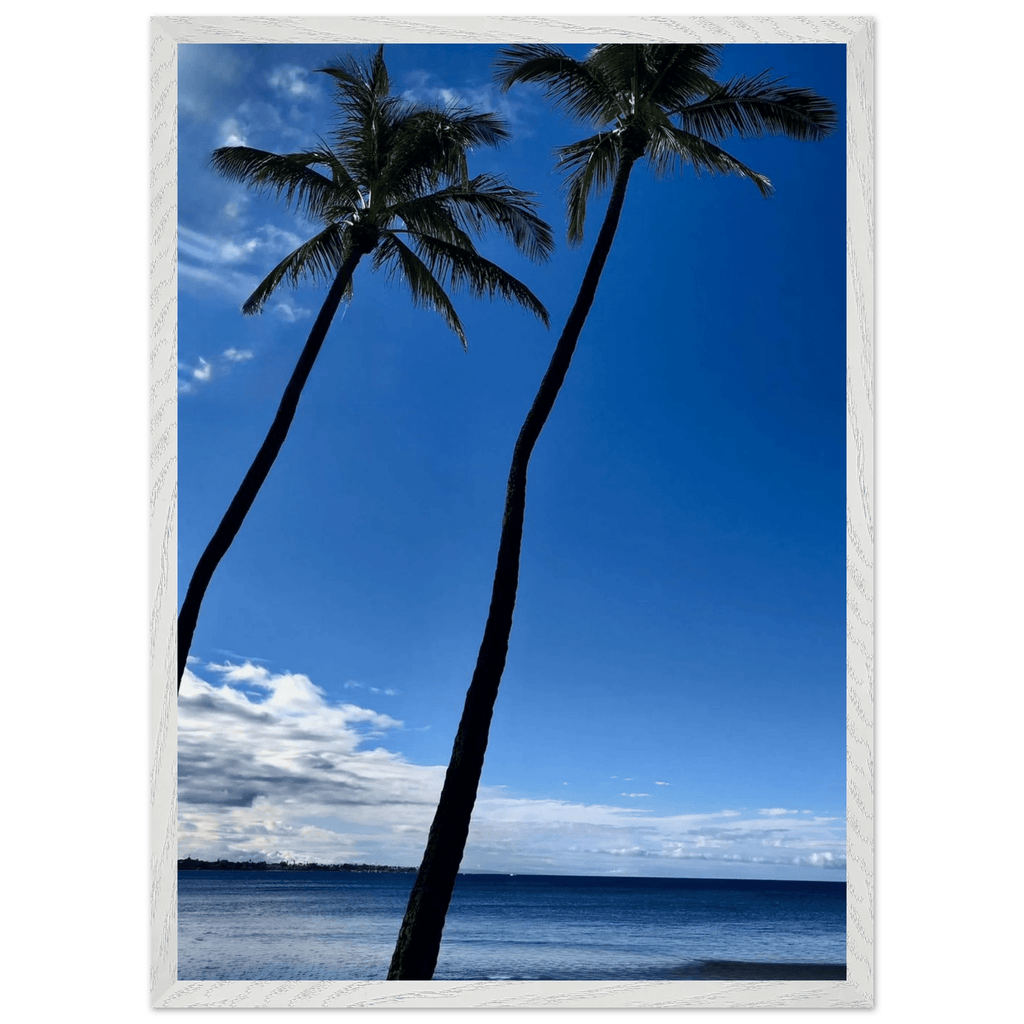 Framed print of Hawaii iconic palm tree twins and Pacific waves by CaliCuration, 15x20 cm, mounted on white frame.