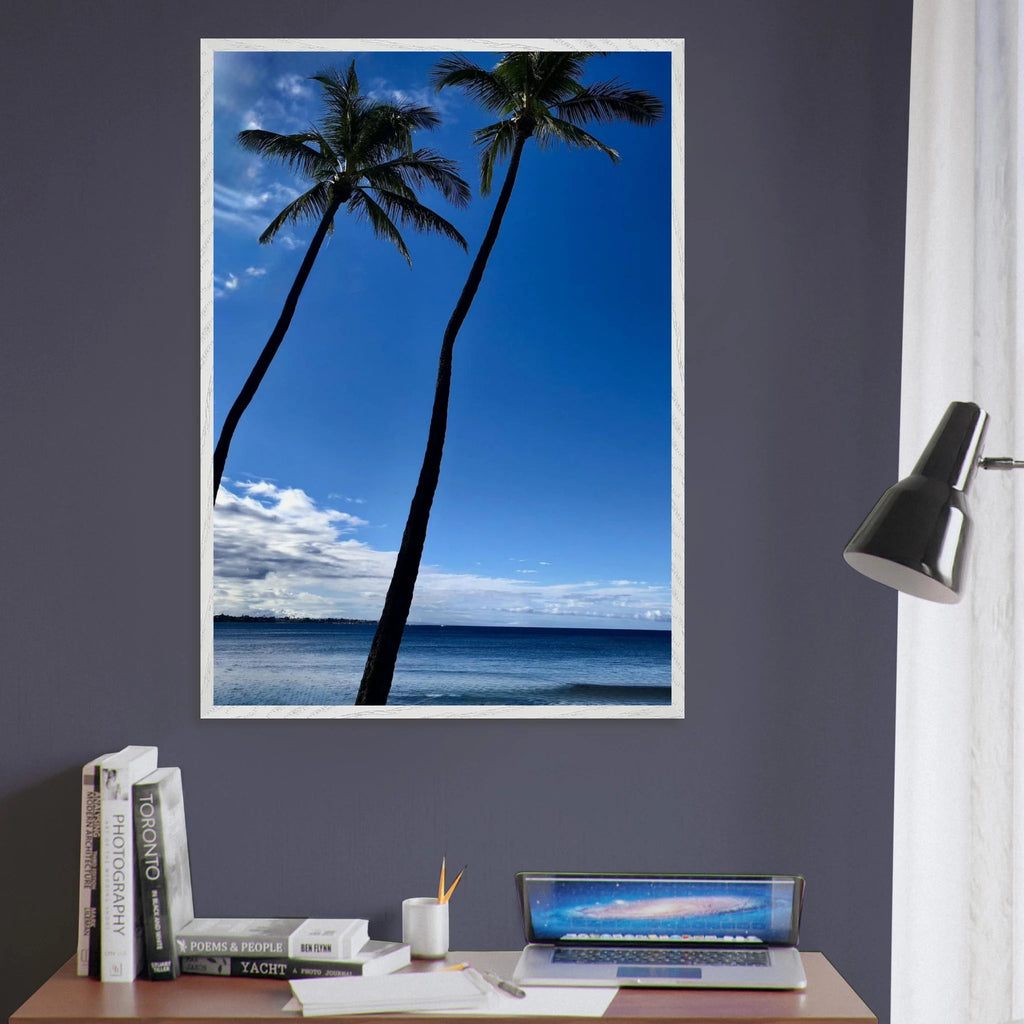 Framed Hawaii travel poster featuring iconic palm tree twins and Pacific waves, mounted in a white frame, Studio Edition Spring '26.