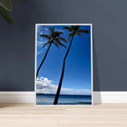 Framed Hawaii travel poster featuring iconic palm tree twins and Pacific waves, mounted on white frame, studio edition print.