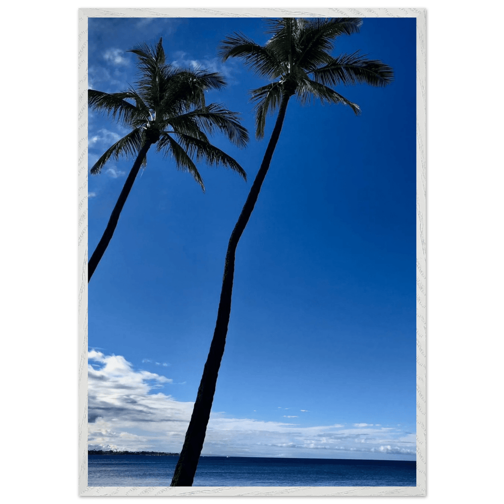 Framed Hawaii travel poster featuring iconic palm trees and Pacific waves, mounted on white frame, studio edition print.