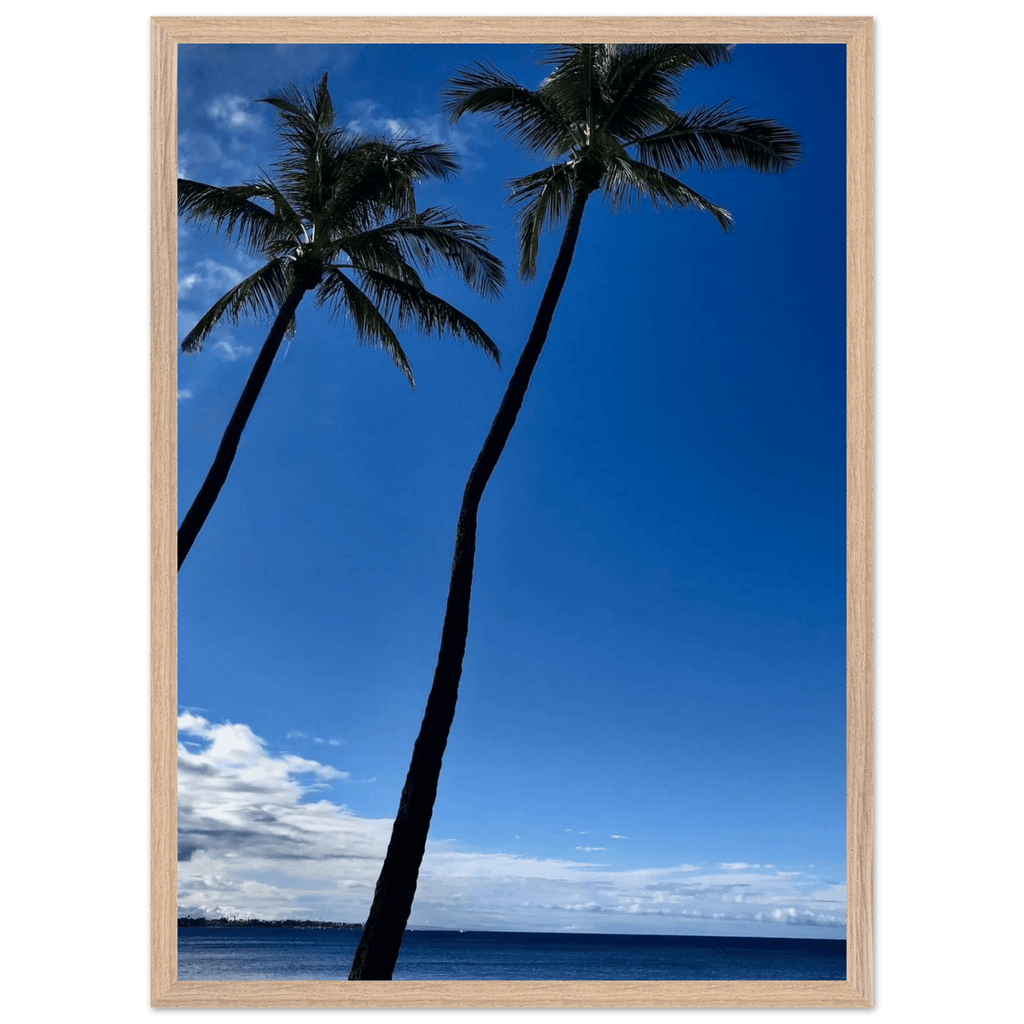 Framed Hawaii travel poster featuring iconic palm trees and Pacific waves, mounted print by CaliCuration in a white frame.