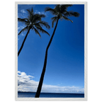 Framed Hawaii travel poster with iconic palm trees and Pacific waves, featuring a white frame and vibrant tropical scenery.