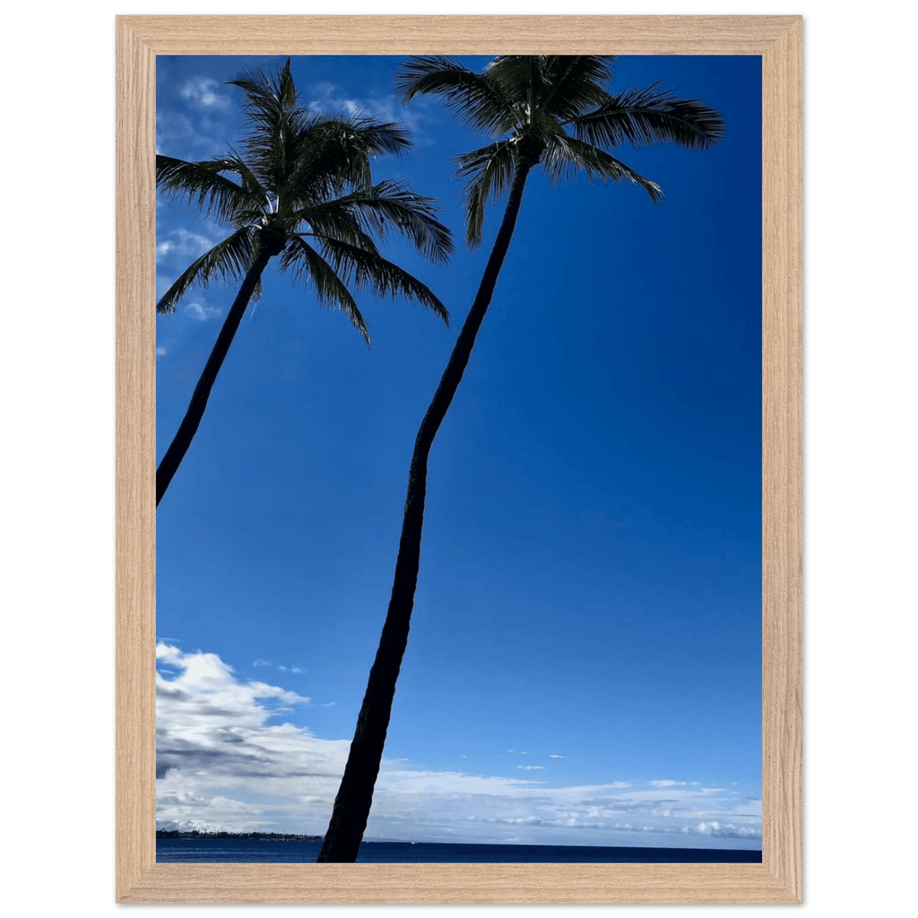 Framed Hawaii travel poster featuring iconic palm tree twins and Pacific waves, mounted in a white 15x20 cm frame.