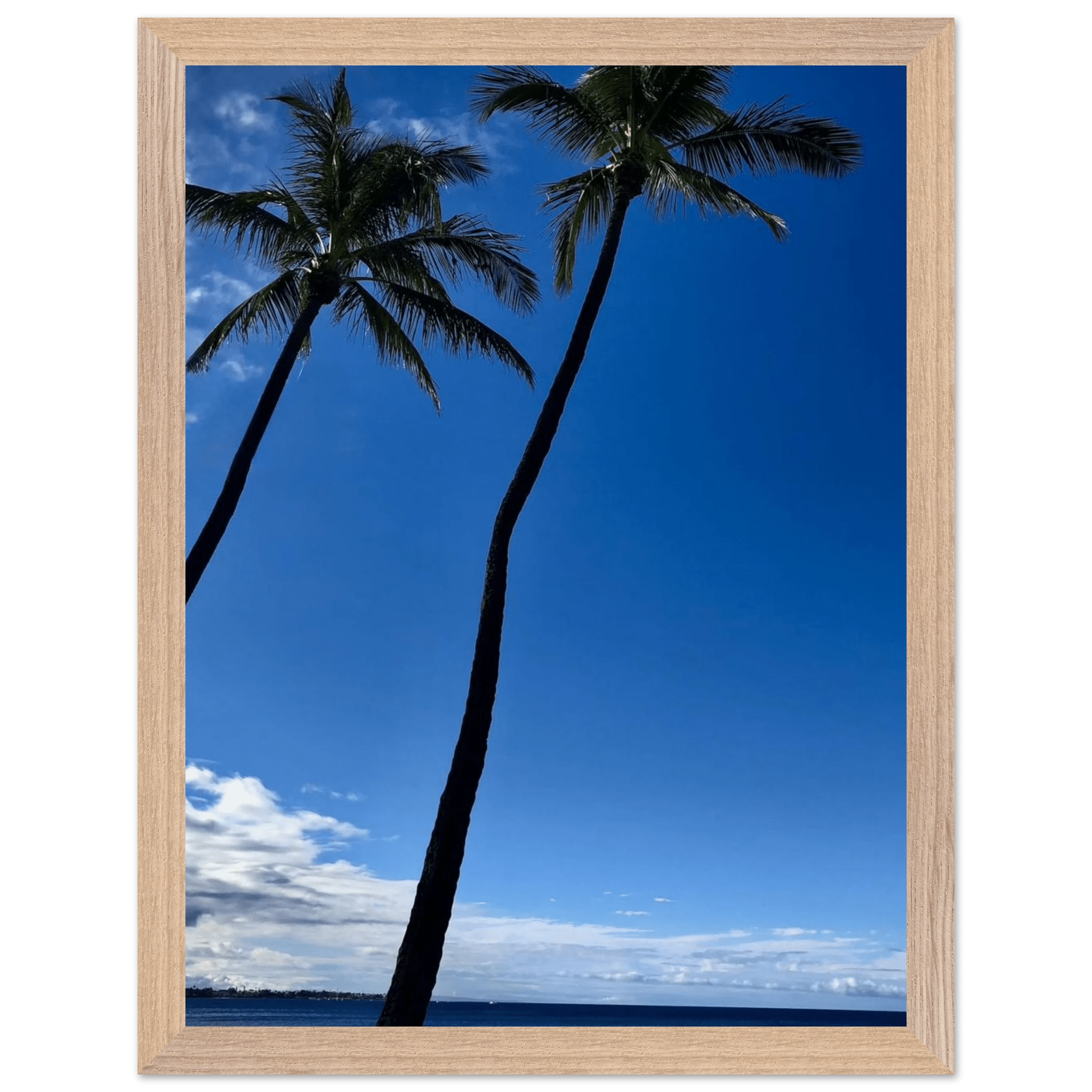 Framed Hawaii travel poster featuring iconic palm tree twins and Pacific waves, mounted in a white 15x20 cm frame.