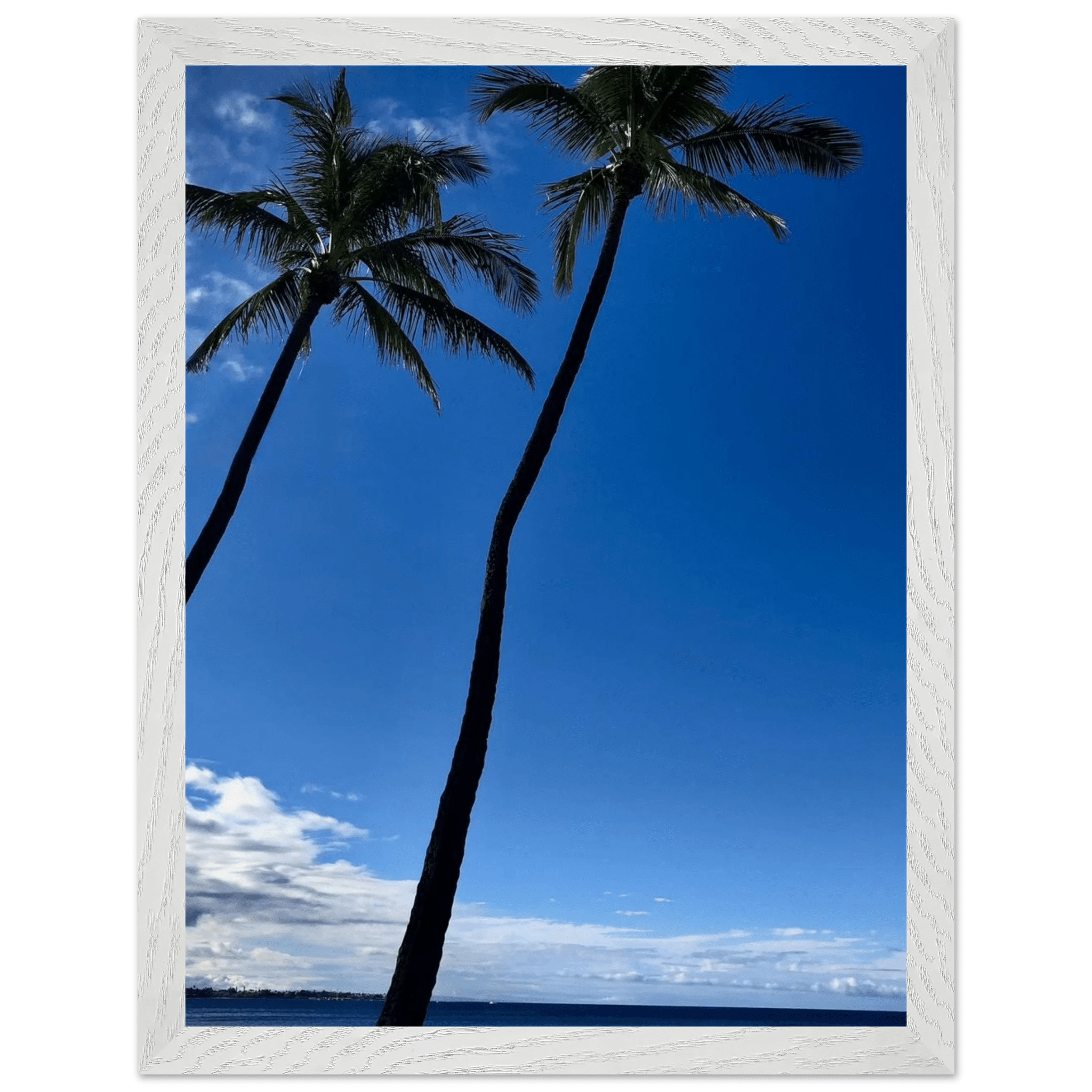 Framed Hawaii travel poster featuring iconic palm trees and Pacific waves, mounted print with white frame by CaliCuration.