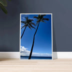 Framed Hawaii travel poster featuring iconic palm trees, twin palms, and Pacific waves in a white frame, studio edition print.