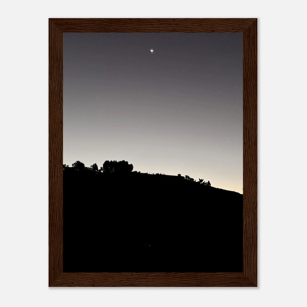Black and white wooden framed poster featuring a fall new moon scene from Hollywood Hills California art print by Studio Edition.