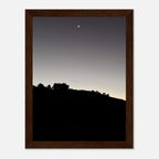 Black and white wooden framed poster featuring a fall new moon scene from Hollywood Hills California art print by Studio Edition.