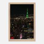 Wood-mounted framed poster of NYC downtown night view featuring the Empire State Building, part of the Studio Edition travel collection.