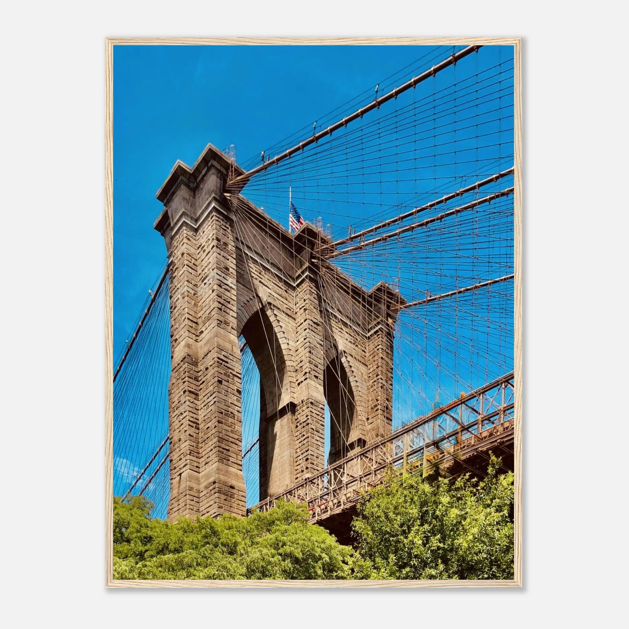 Framed NYC Brooklyn Bridge poster featuring a Dumbo view, showcasing a vibrant summer cityscape print from the Travel Collection.