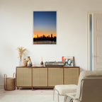 Manhattan skyline sunset framed poster, NYC wall art print, vibrant cityscape image on high-quality print material.