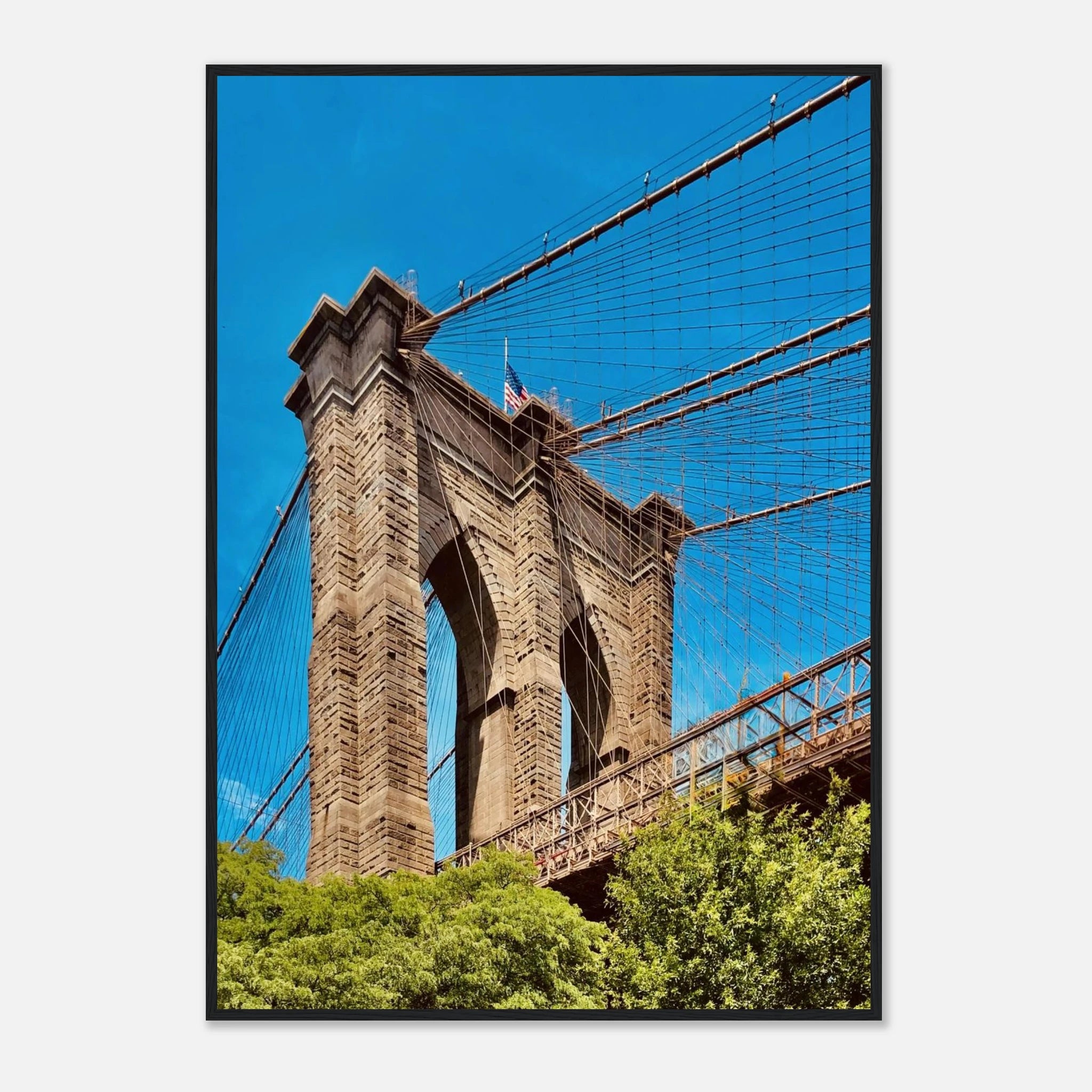 Framed print of NYC Brooklyn Bridge with Dumbo view, part of the Studio Edition travel collection, showcasing a stunning summer skyline.