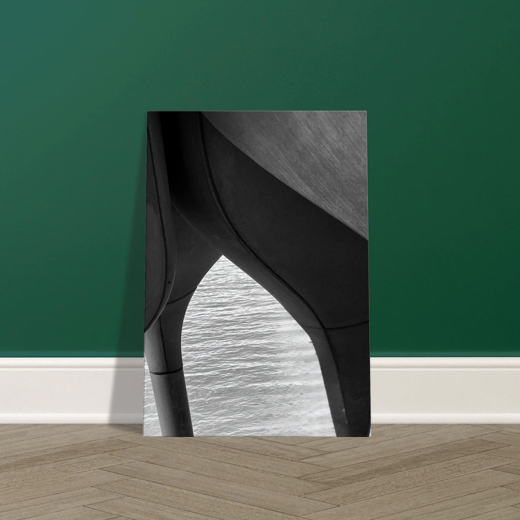 Black and white abstract canvas print of NYC Hudson River pier with high heels in water, part of Studio Edition Travel Collection.