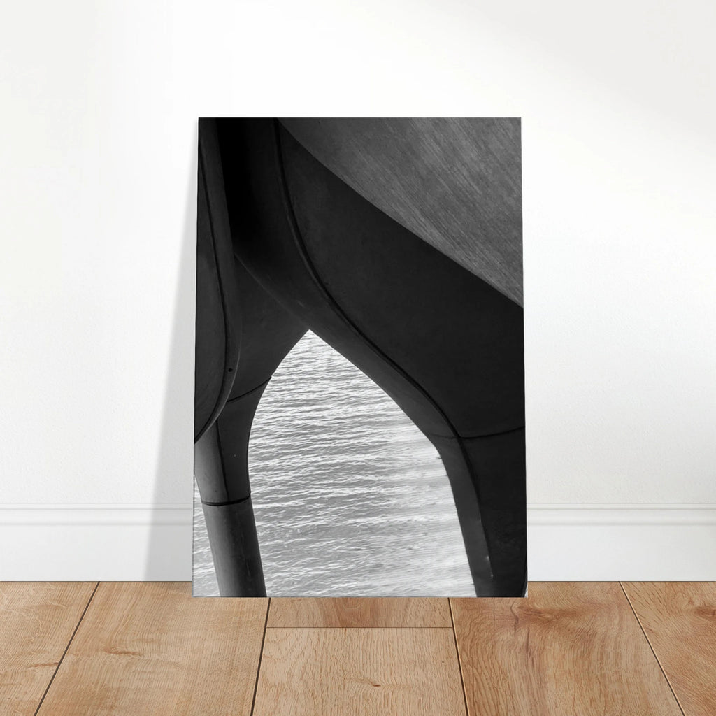 Black and white abstract canvas print of NYC Hudson River pier with high heels in water, from the Studio Edition Travel Collection.