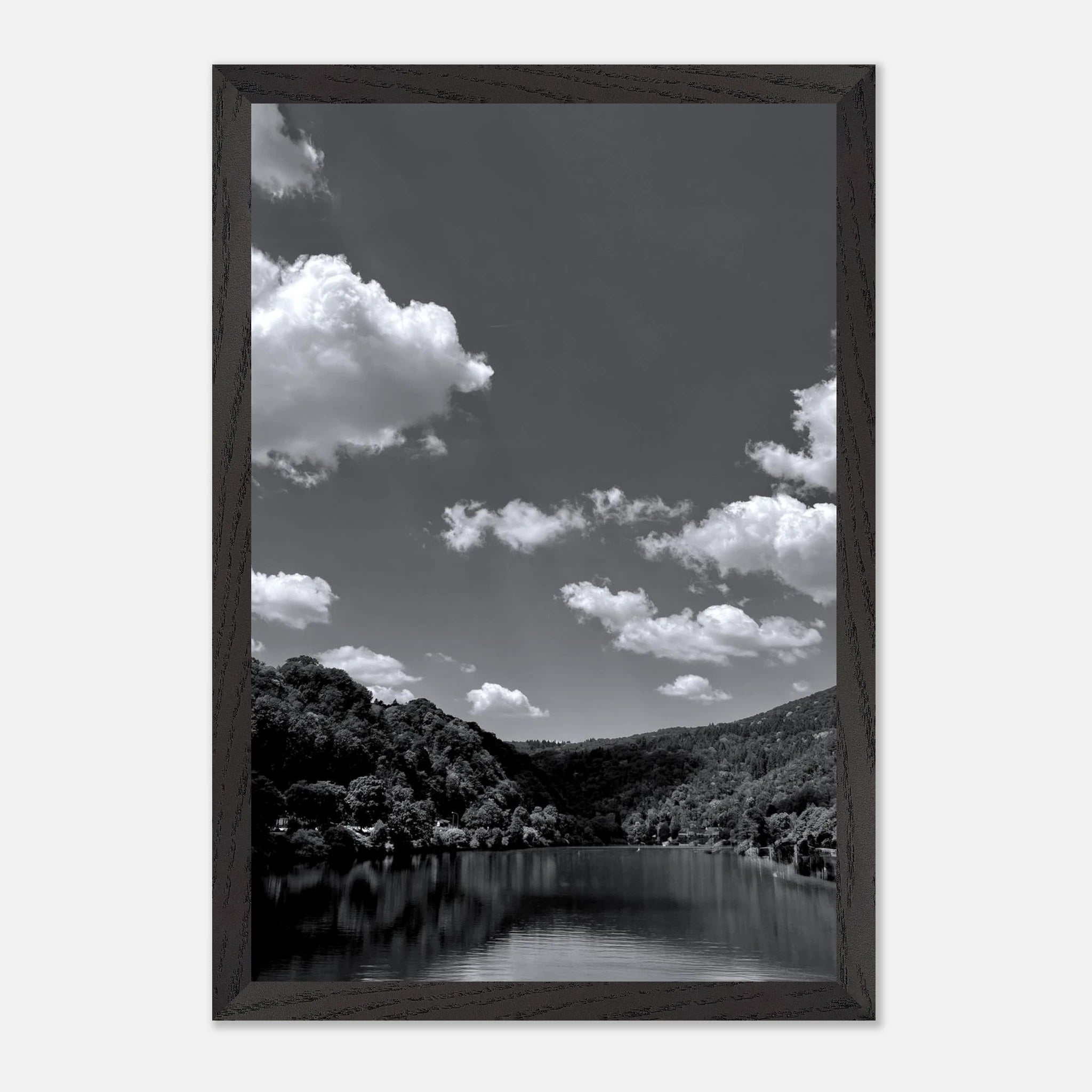 Black and white mounted framed poster of a German river view from the Studio Edition Spring 2026 travel collection, print material.