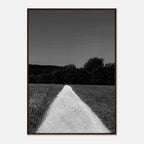Black and white framed poster print of a summer road scene from the Travel Collection, featuring a timeless chic travel vibe.