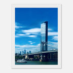 Framed NYC Manhattan Bridge and East River urban photography print, showcasing iconic New York City scenery in vibrant detail.