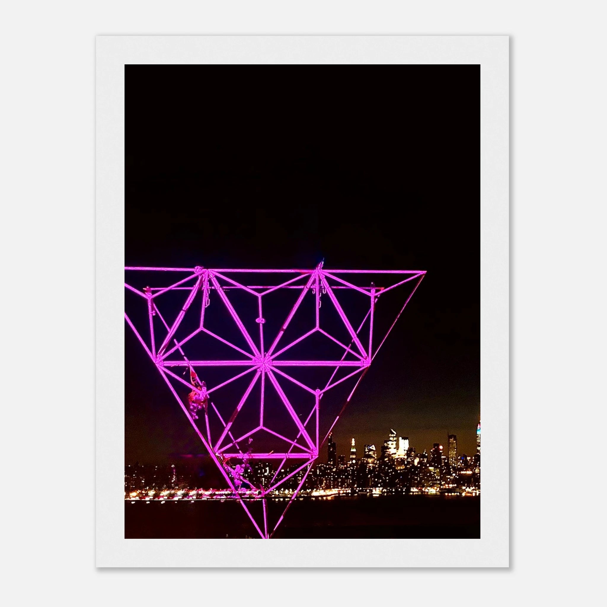 Framed print of New York City holiday art installation featuring a vibrant Manhattan night view with Empire State Building, in purple hues.