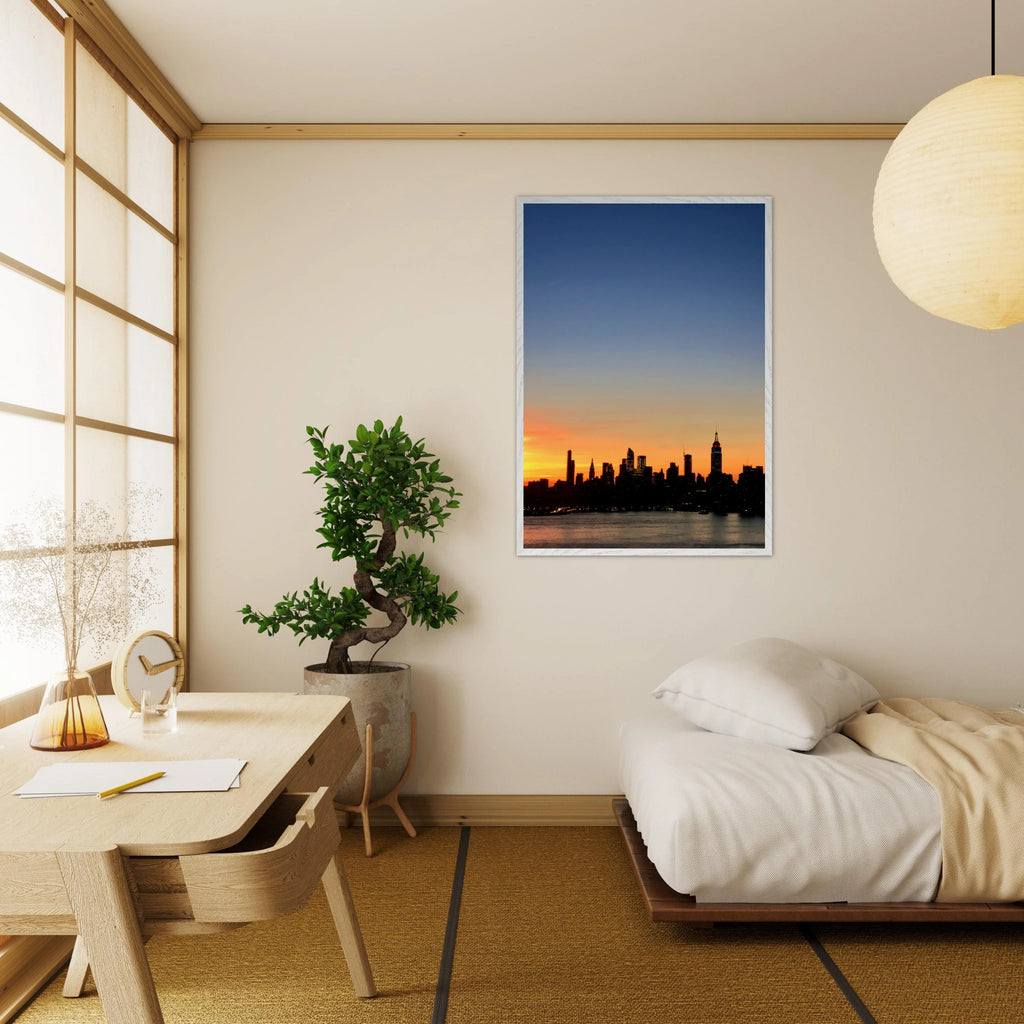 Manhattan skyline sunset framed poster, NYC wall art print on high-quality material, showcasing iconic cityscape at dusk.