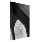 Black and white abstract canvas print of NYC Hudson River Pier with high heels in water, from the Studio Edition Travel Collection.