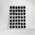 Black and white monochrome skull grid canvas wall art, minimalist statement photography print from the Travel Collection Studio Edition.