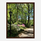 Framed art print of a Central Park walkway scene on premium matte paper, featuring lush trees and a peaceful stroll.
