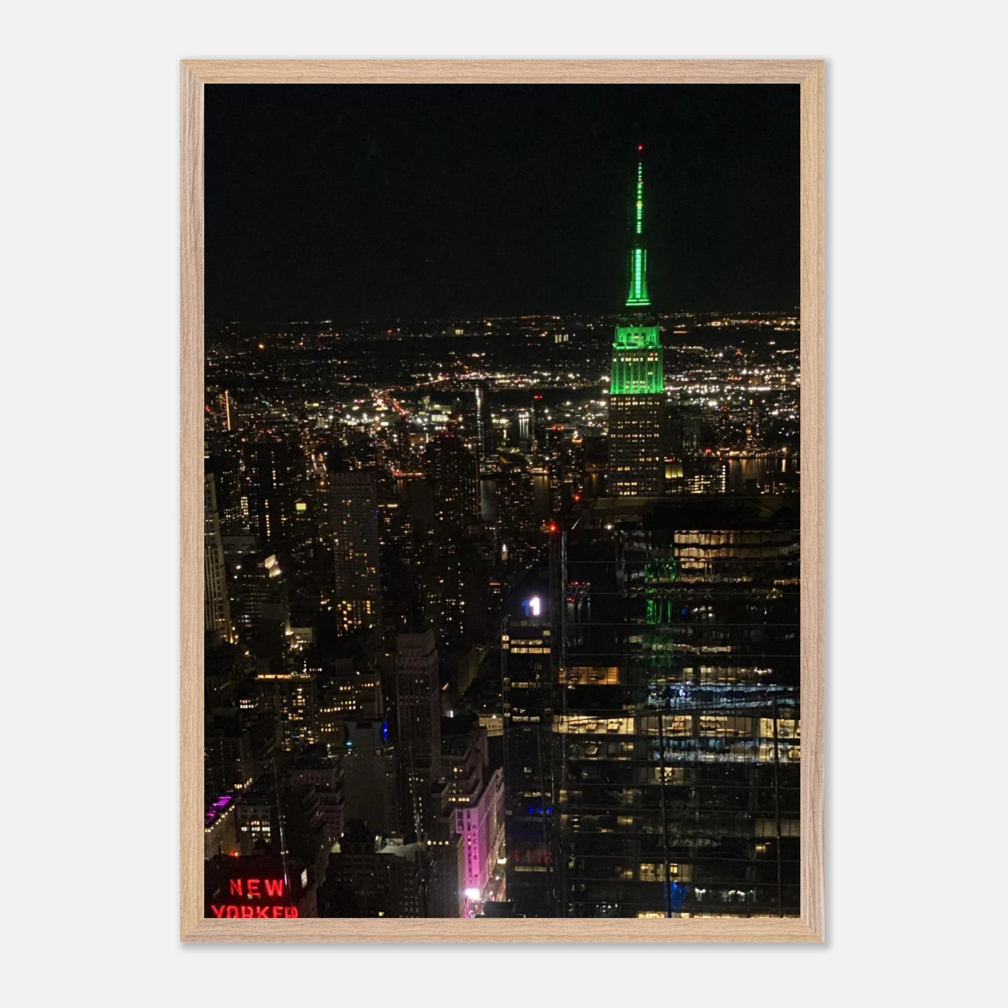 Wood-mounted framed poster of NYC downtown night view with Empire State Building, part of the Studio Edition travel collection.