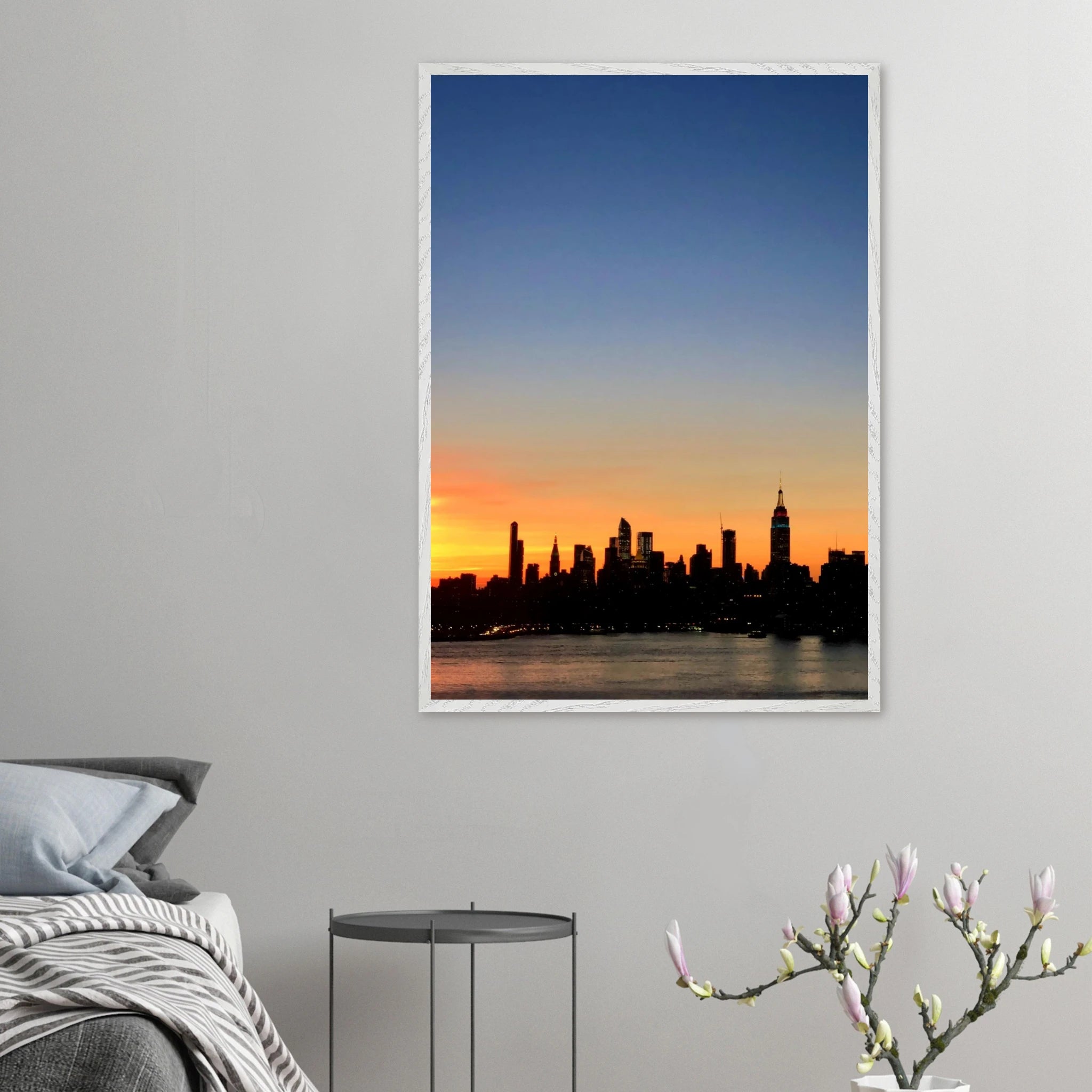 Wooden framed poster of Manhattan skyline at sunset, travel-themed wall art from the Studio Edition print collection.